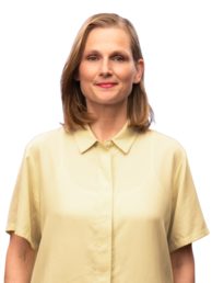 Portraitaufnahme von Anne Fromm in beiger Bluse.