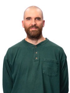 Portraitaufnahme von Sören Gerhardt in grünem Langarmshirt.